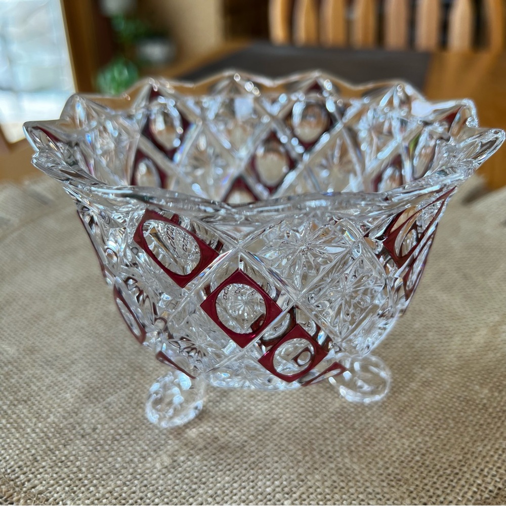 Vintage clear crystal and cranberry patterned three footed candy dish/ bowl.
